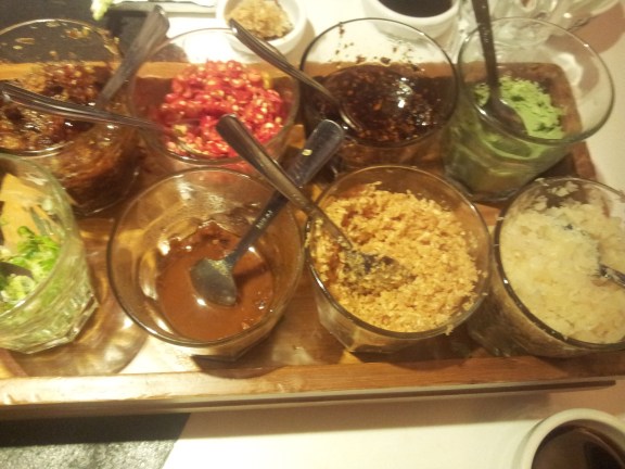 condiments platter - haebeehiam, chilli, chilli oil, wasabi, spring onions, sesame sauce, garlic etc