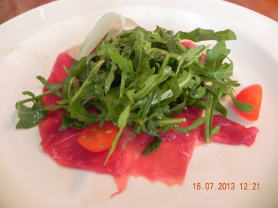 beef carpaccio with ricola salad & shaved parmesan