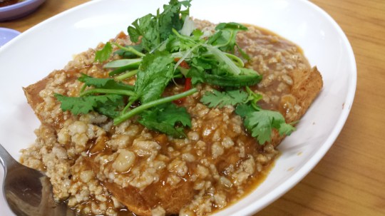 deep-fried tofu drizzled with minced pork