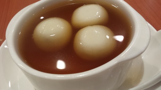 sesame dumplings in ginger tea 姜茶汤圆