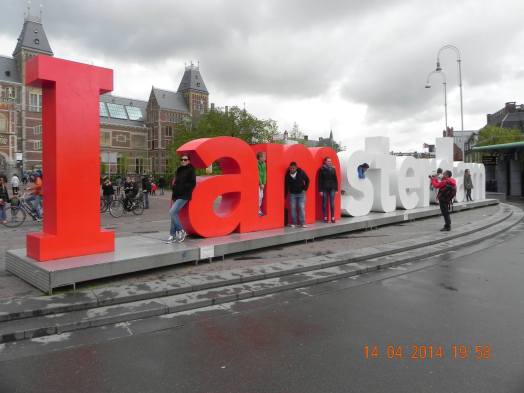 i amsterdam in front of rijksmeseum