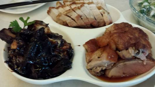 3 roasts = char siew, roast pork, roast duck