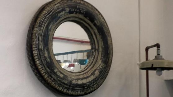 torn tyre mirror