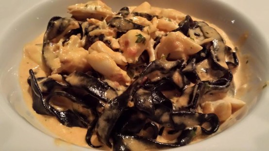 crab squid-ink linguine in pink sauce