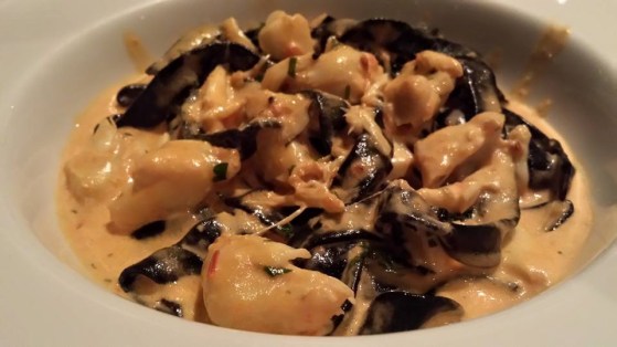 crab squid-ink linguine in pink sauce