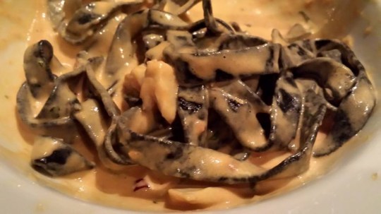 crab squid-ink linguine in pink sauce