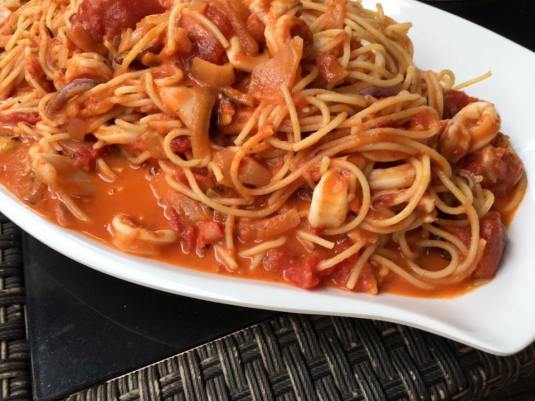 seafood spaghetti in pink sauce (creamy tomatoes)