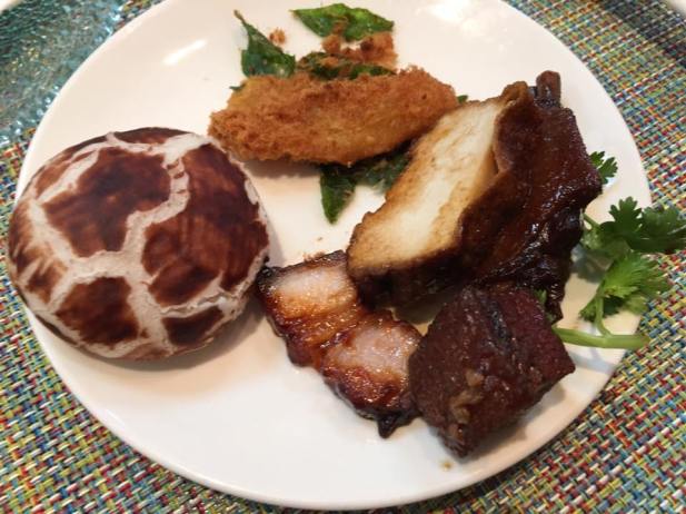 lotus bun, pumpkin, braised duck wing