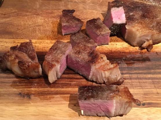 pan charred grain fed black angus ribeye