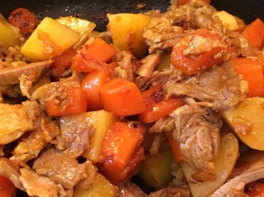 lean pork with onions, carrot, potatoes