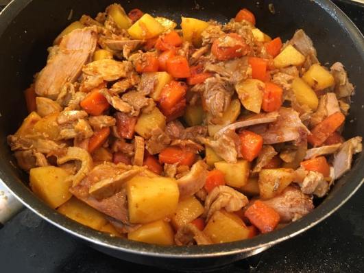 lean pork with onions, carrot, potatoes