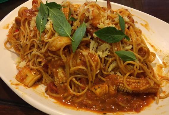 seafood spaghetti in pink sauce