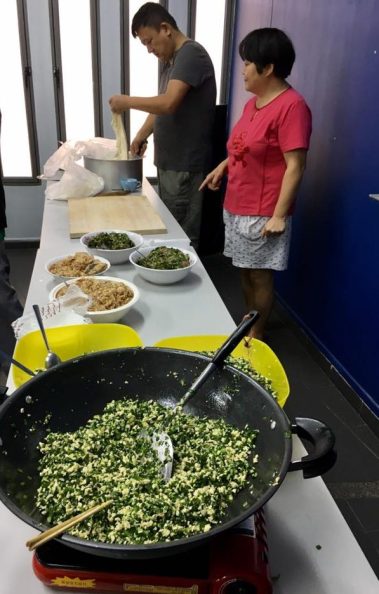 one resident demonstrates making dumpling 饺子